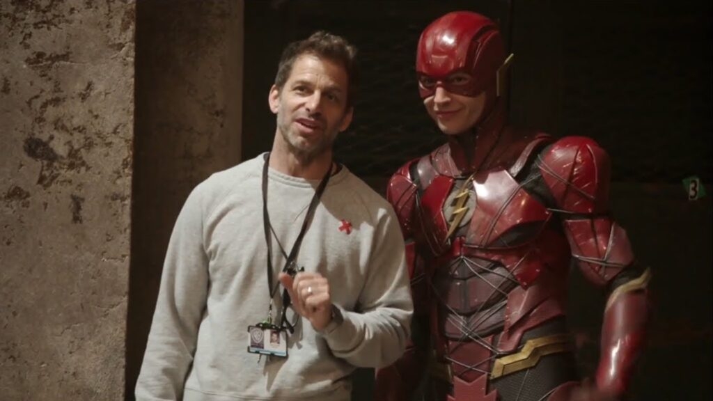 Ezra Miller with Zack Snyder
