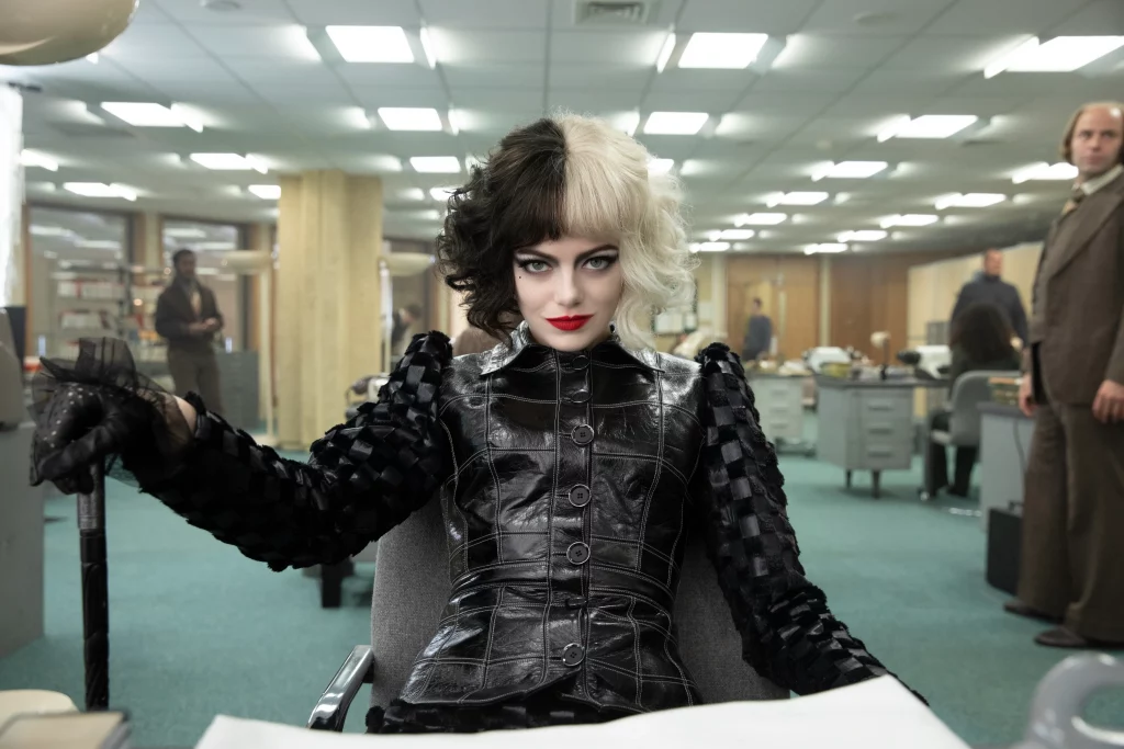 Emma Stone in and as Cruella De Vil