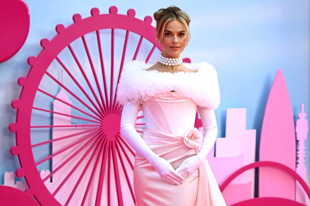 Australian actress Margot Robbie poses on the pink carpet upon arrival for the European premiere of "Barbie" in central London on July 12, 2023.