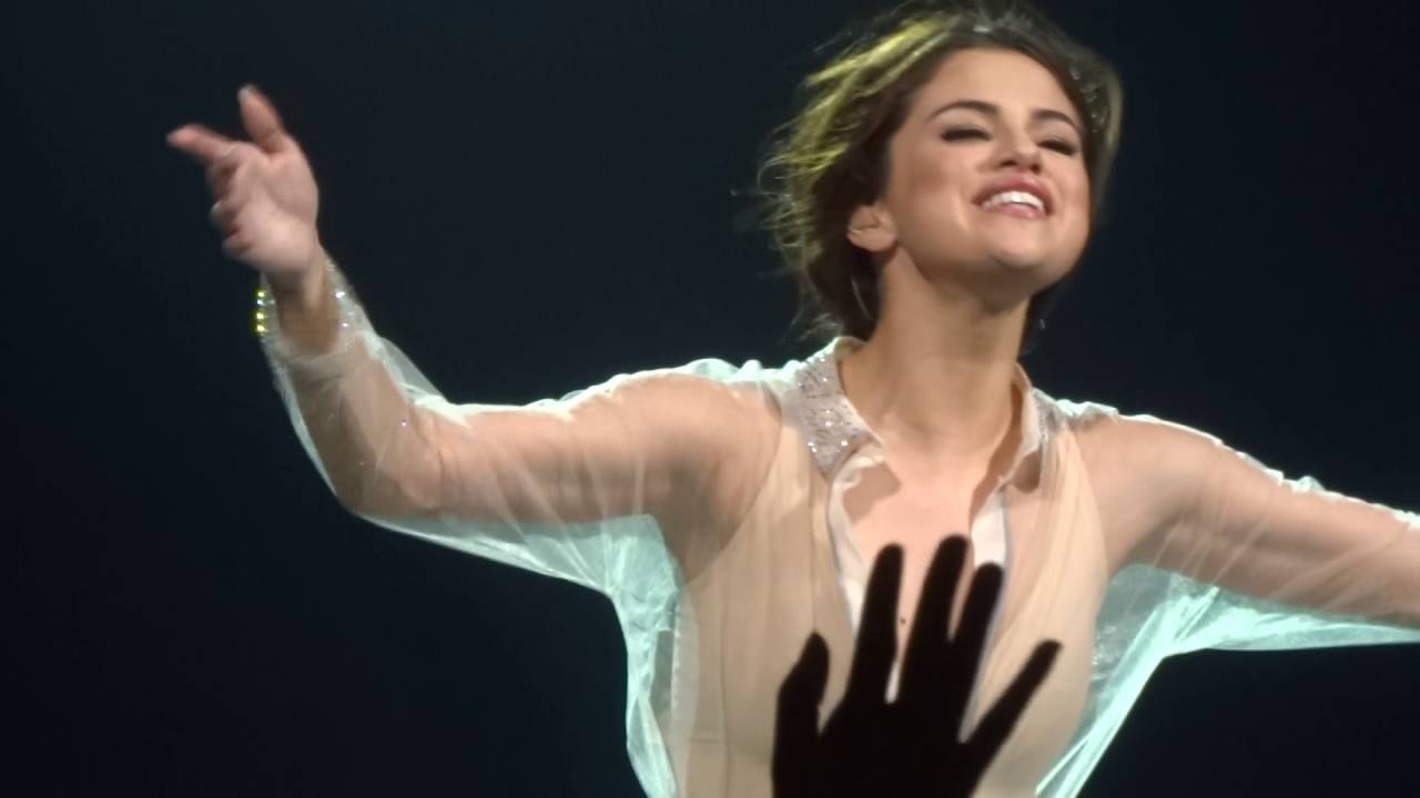 Selena Gomez performing her song Who Says live