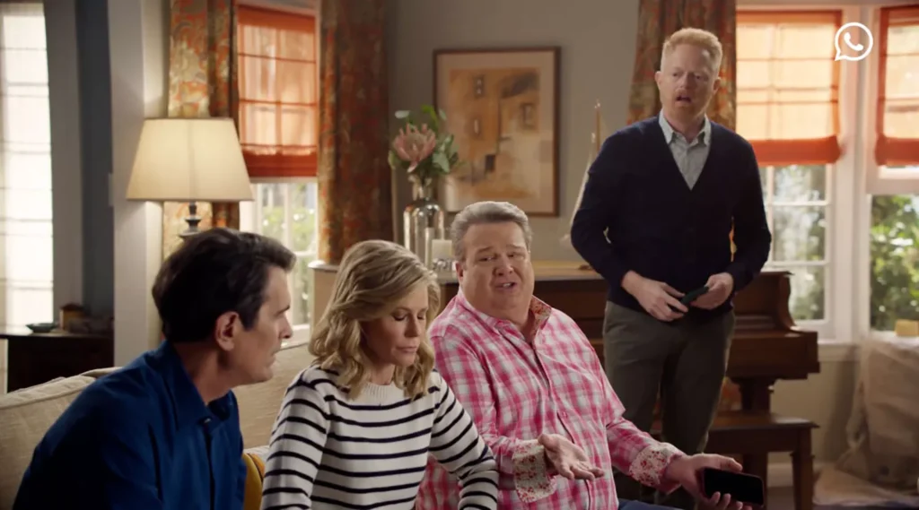 Ty Burrell, Julie Bowen, Eric Stonestreet and Jesse Tyler Ferguson in a still from the commercial for WhatsApp | Source: YouTube