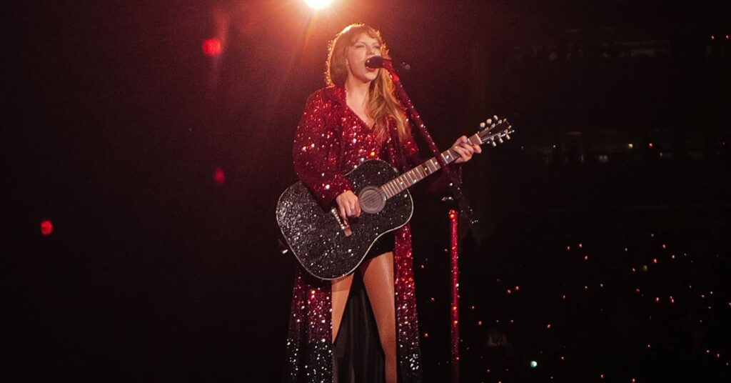 Taylor Swift performing at the Eras Tour