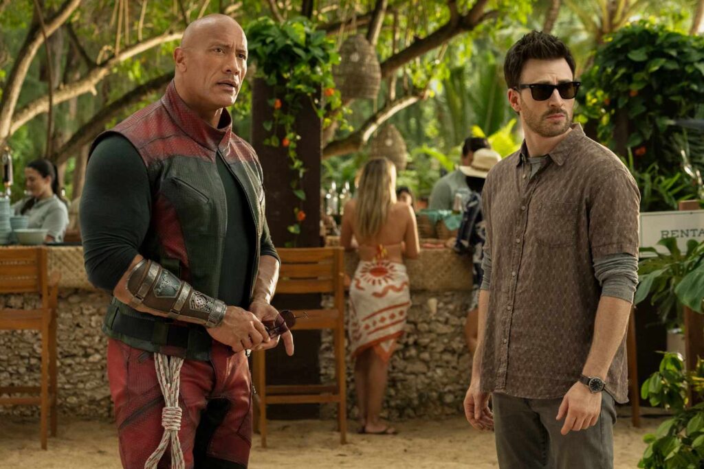 Dwayne Johnson and Chris Evans in a still from Red One