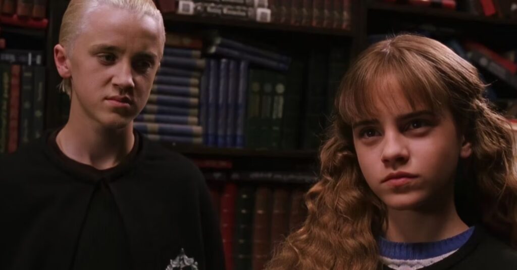 Tom Felton and Emma Watson in Harry Potter and the Chamber of Secrets