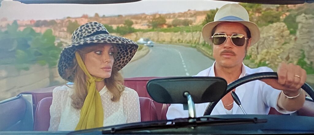 Brad Pitt and Angelina Jolie in a car in By the Sea | Universal Pictures