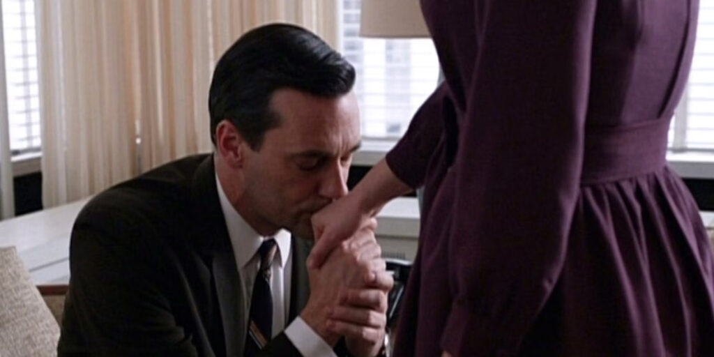 Don kissing Peggy's hand 