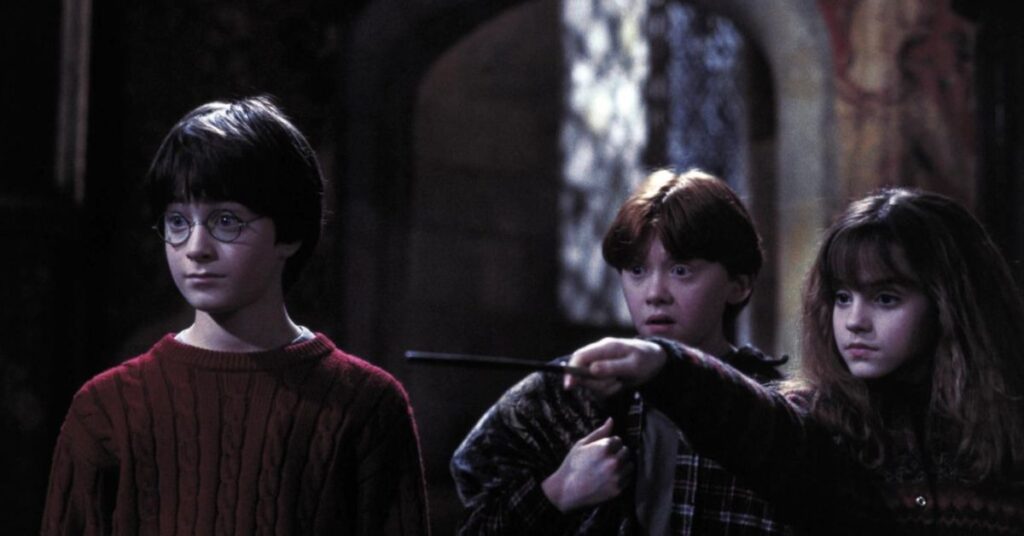 Daniel Radcliffe, Rupert Grint, and Emma Watson in Harry Potter and the Sorcerer's Stone