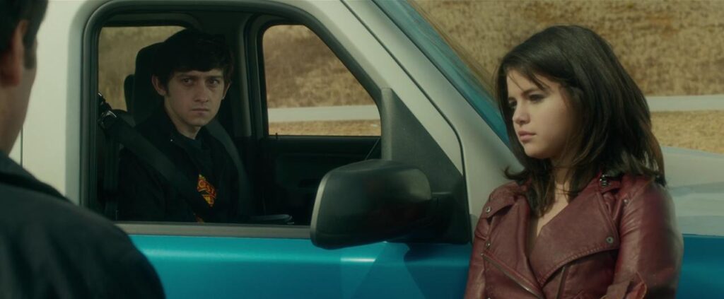 A car scene featuring Selena Gomez alongside Craig Roberts and Paul Rudd in The Fundamentals of Caring 