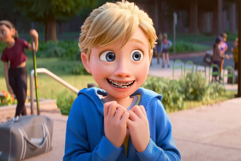 Riley smiling and with braces in a scene from Inside Out 2