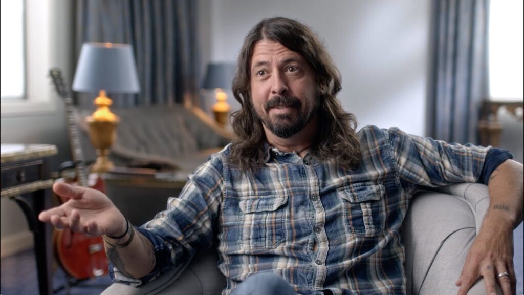 Dave Grohl snarrating in a still from How I Ended Up In Seattle