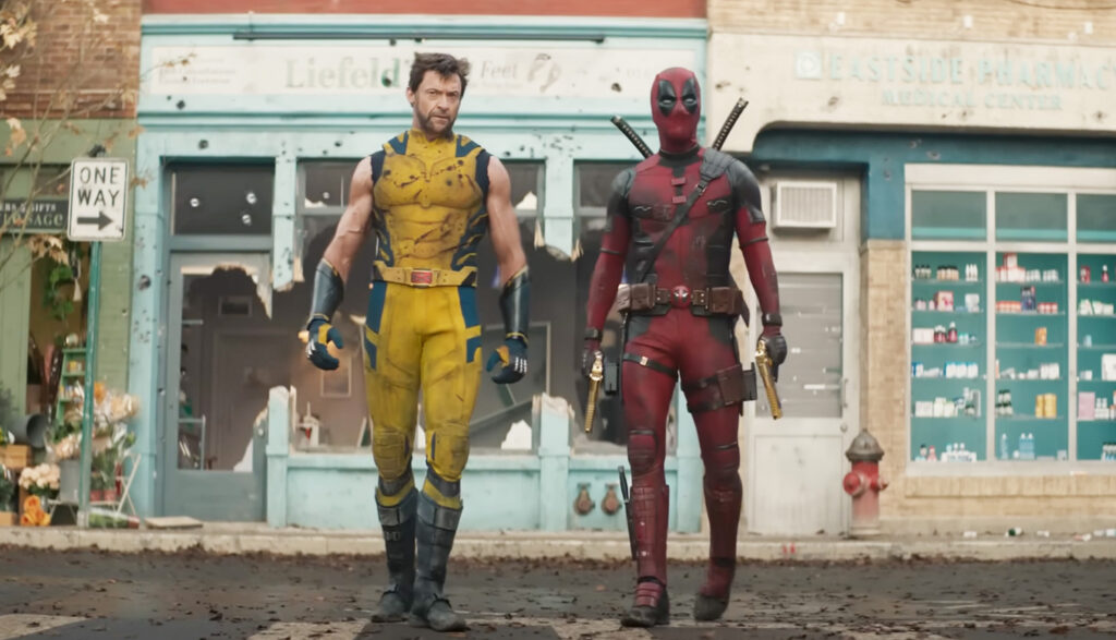 An action still of Ryan Reynolds and Hugh Jackman from Deadpool & Wolverine