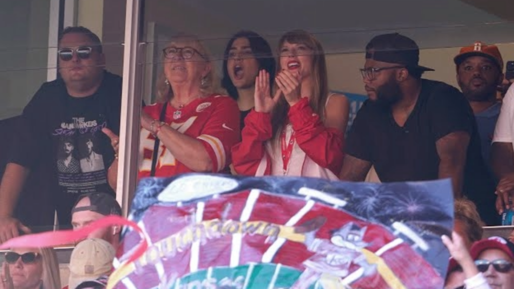 Taylor Swift cheering for Travis Kelce alongside Donna Kelce