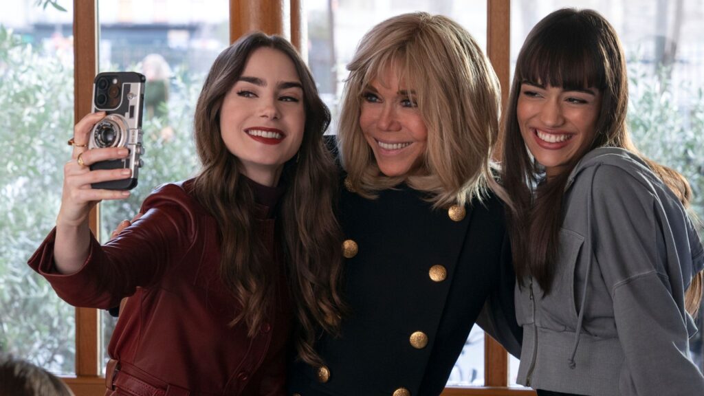 Lily Collins, Briggite Macron and Thalia Besson in Emily in Paris