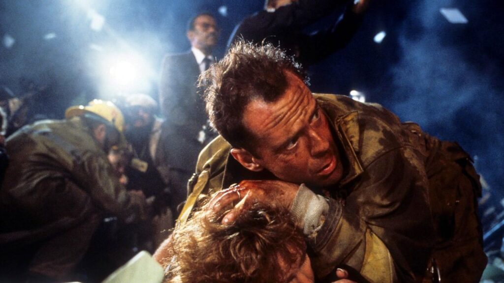 Bruce Willis, Bonnie Bedelia, and Reginald VelJohnson in Die Hard