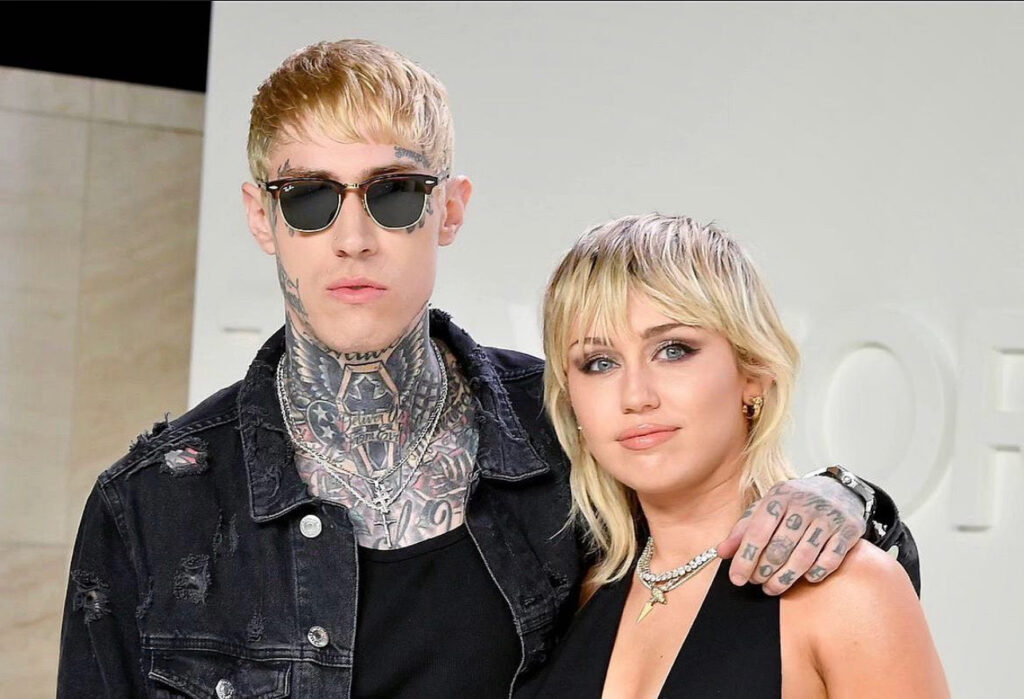 Miley Cyrus and Trace Cyrus 