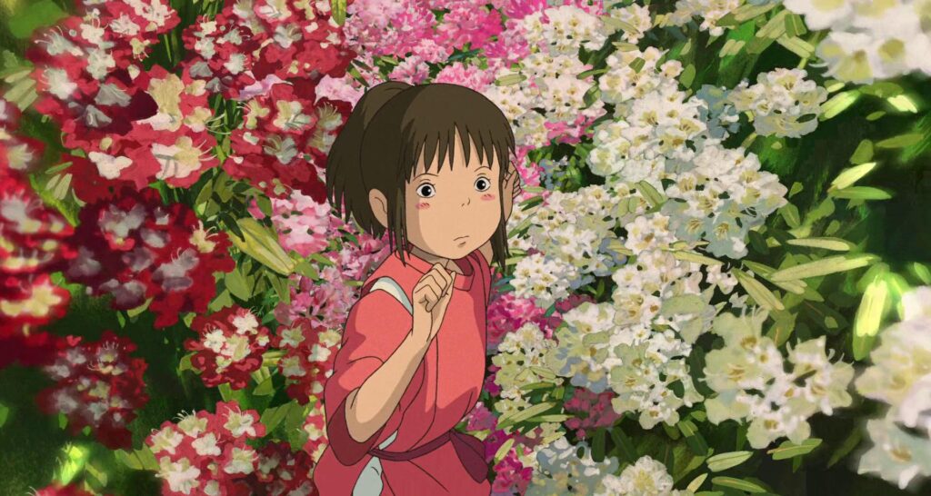 Chihiro walking through flowers