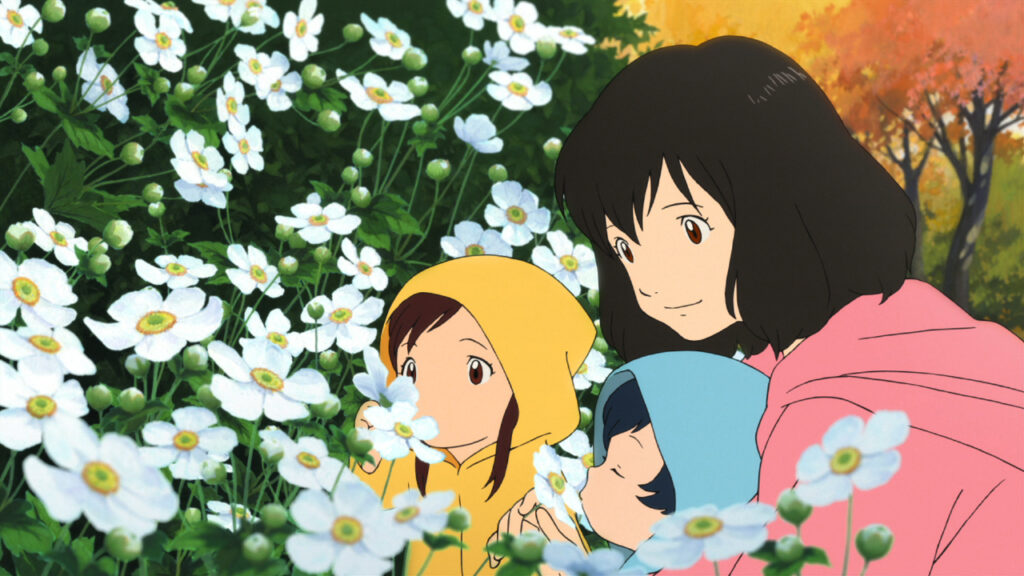 Hana, Ame, and Yuki looking at flowers