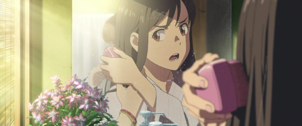 Every Makoto Shinkai Movie, Ranked 8 Suzume making her hair