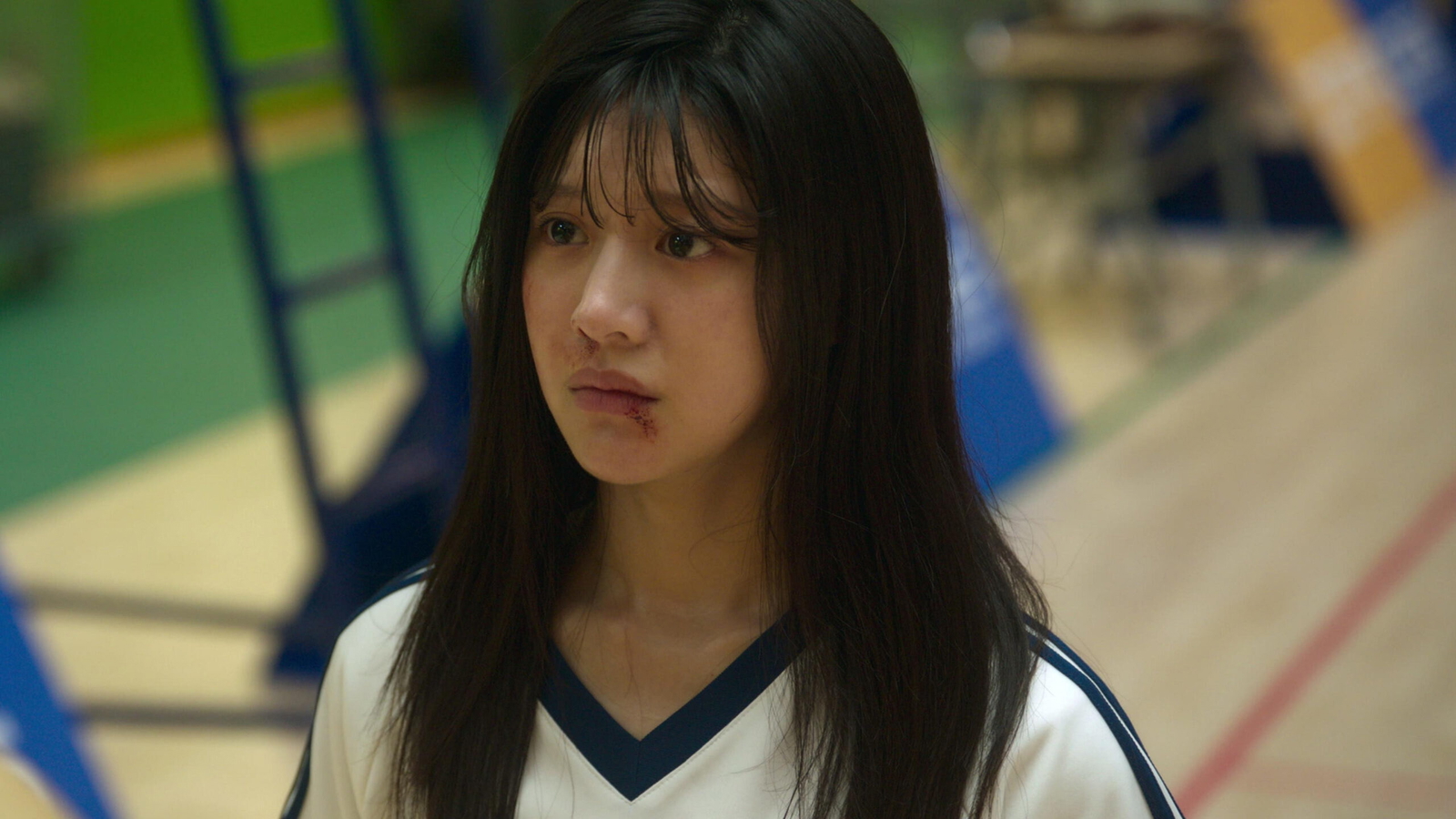 A girl with a scar on her face from Moving