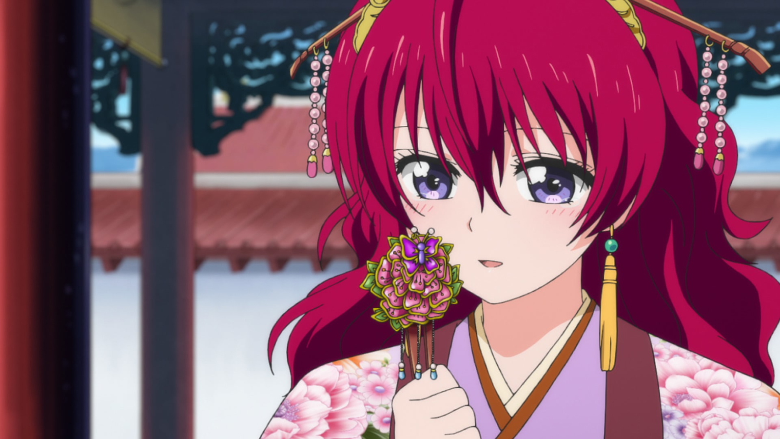 yona sniffing a flower