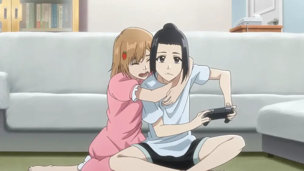Yuzu clinging to Karin during an earthquake in Bleach anime